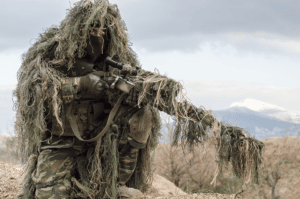 Sniper in a ghillie suit